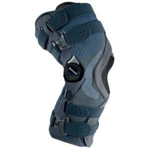 Soft hinged knee brace on a white background
