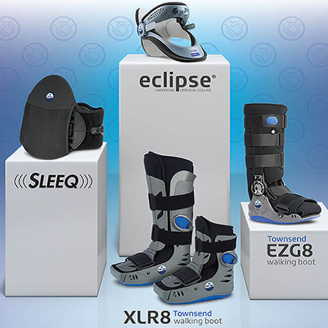 Spinal braces and walking boots on pedestals